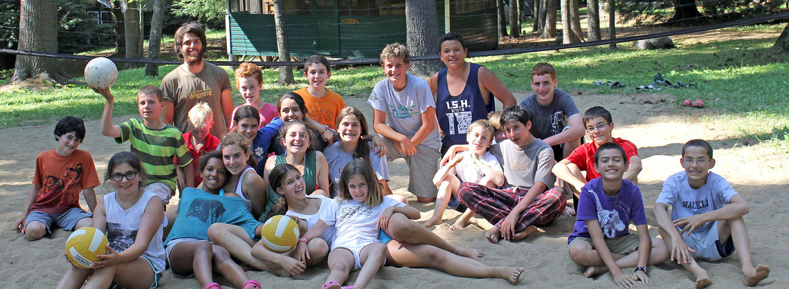 group of campers on volleyball court